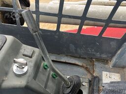 Takeuchi TL130 with forks and loader bucket