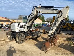 Terex TW110 with two-piece offset boom and 3 buckets