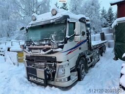Volvo FM500 snow plough equipped tridem hook truck