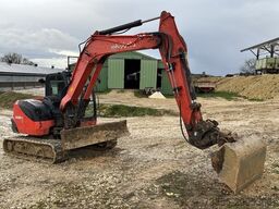Kubota KX080-4 with 3 excavator buckets