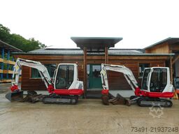 Takeuchi TB 235 mit POWERTILT