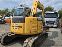 NEW HOLLAND E70SR-1ES
