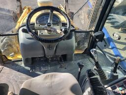 Komatsu WB93R-5. Mixta.