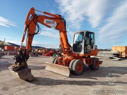 Takeuchi TB 295 W with Rototilt and 3 excavator buckets