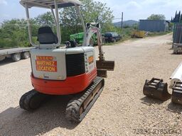 Takeuchi TB23R with 3 excavator buckets