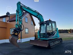 Kobelco SK75SR-3E crawler excavator with rototilt, 4 bucke