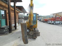 Takeuchi TB 235 mit Powertilt