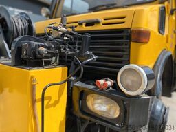UNIMOG 427/21 Schienenreiniger