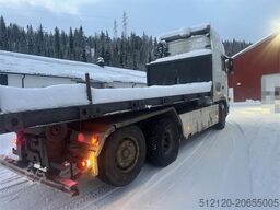 Volvo FH12 snow-plow equipped hook truck with Danish cab