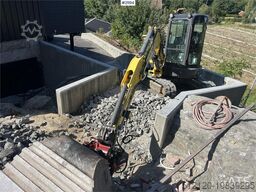 New Holland E55B excavator w/ digging bucket, sanding bucket,