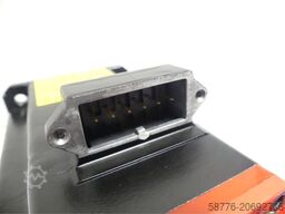 Fanuc A06B-0216-B200 # 0100 Motor SNC05XF2945 + A860-2000-T321 --