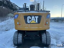 CAT M314F wheeled excavator w/ two buckets, Gigant tra