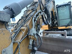 CAT M314F wheeled excavator w/ two buckets, Gigant tra