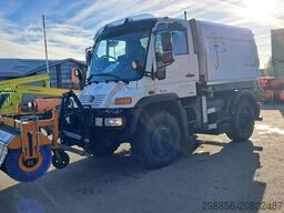 Unimog U400 met Schmidt SK350 veegmachine