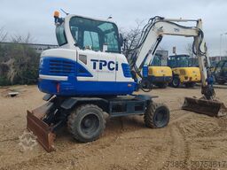 Hyundai R55W-9A with 3 excavator buckets