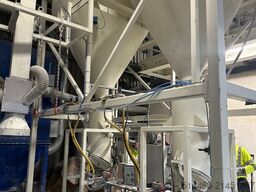 Línea de llenado de bolsas con dosificadores por disparo  