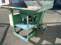 APPLICATION BELT APPLICATION BELT WITH VIBRATING FEEDER