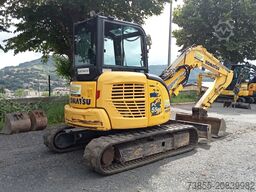 Komatsu PC55MR-5E0 with 3 buckets