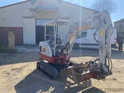 Takeuchi TB225 with 3 buckets and hammer