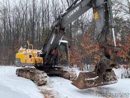 Volvo EC250DNL with 3 excavator buckets
