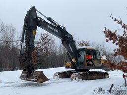 Volvo EC250DNL with 3 excavator buckets