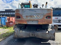 Volvo EW160B wheeled machine w/ support leg and shear