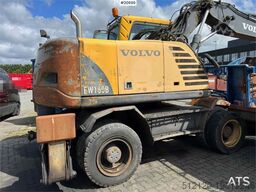 Volvo EW160B wheeled machine w/ support leg and shear
