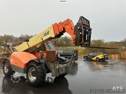 JLG 4017 telehandler w/ two pallet forks and bucket. C