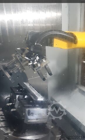 CNC-machinebelading met FANUC-robotcel Teximp d.o.o. URC-12