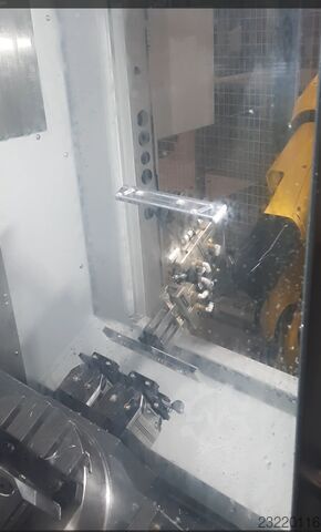 CNC-machinebelading met FANUC-robotcel Teximp d.o.o. URC-12
