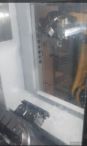 CNC-machinebelading met FANUC-robotcel Teximp d.o.o. URC-12