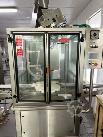 Tablet-/kapseltællings- og fyldelinje fyldte i små bøtter/plastikflasker. Pharma Packaging Systems Various