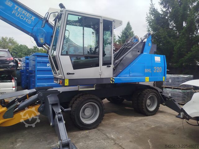 Manipulátor materiálu Fuchs MHL 320 D + Powerhand VRS200