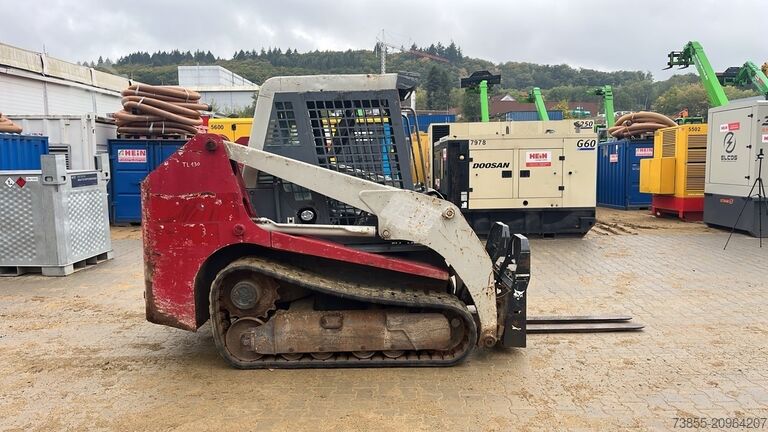 Minipala compatta cingolata Takeuchi TL130 with forks and loader bucket