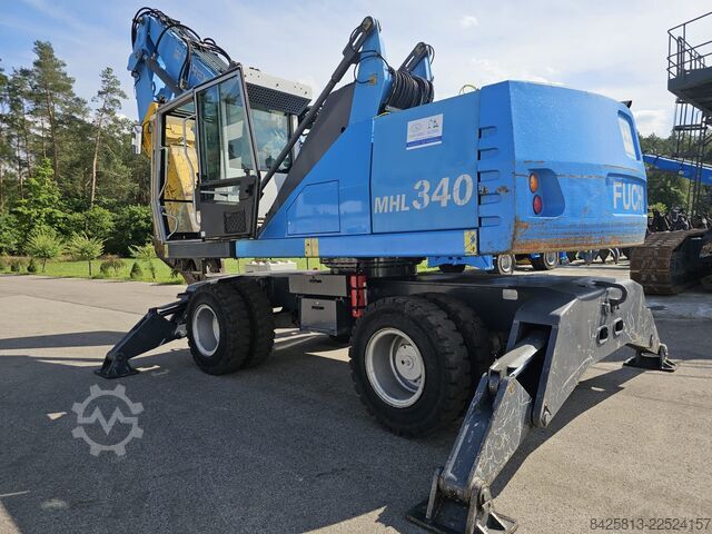 Malzeme taşıma makinesi Fuchs MHL 340 FQC + Genesis GXP300R