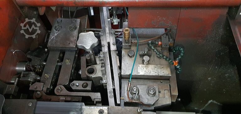 Dispozitiv combinat de ascuțit vârfuri și rulat filete National Machinery FXTC