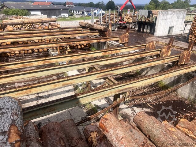 Μονάδα τροφοδότησης κορμών με πριόνι κοπής και κιβώτιο απορρίψεως Springer Springer