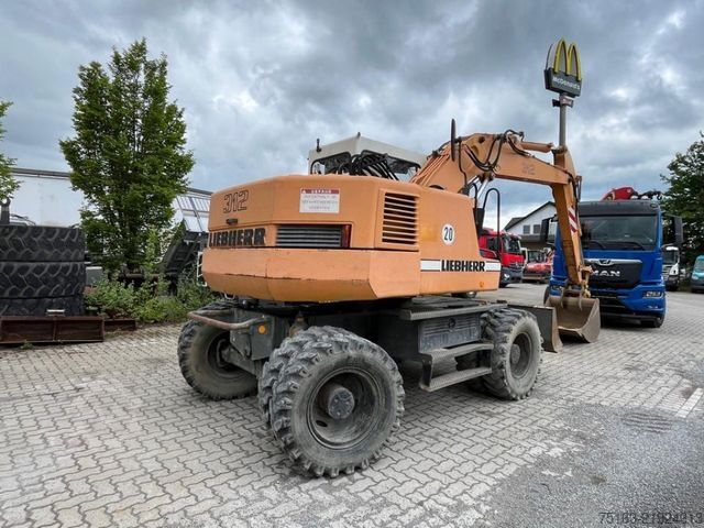 Pelle sur pneus LIEBHERR A 312 Bagger Deutsch Top