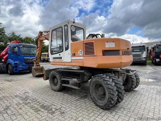 Pelle sur pneus LIEBHERR A 312 Bagger Deutsch Top