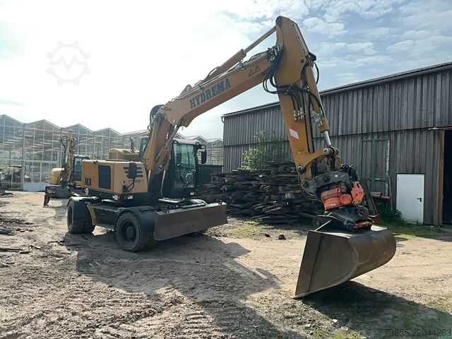 Gumikerekes kotrógép Hydrema RB15-MX18 with tiltrotator, quick coupler and excavator bucket