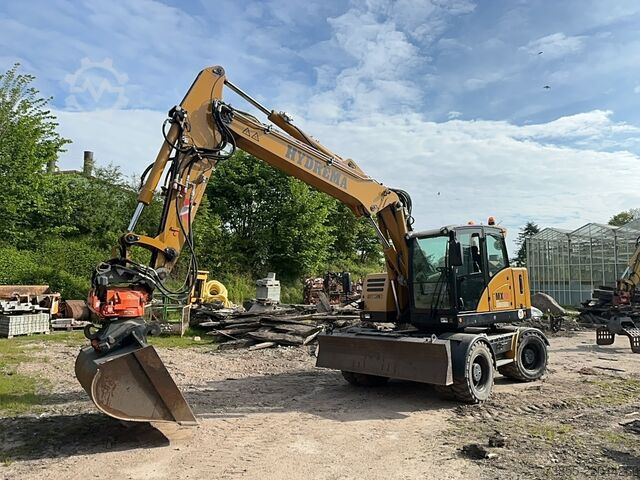 Gumikerekes kotrógép Hydrema RB15-MX18 with tiltrotator, quick coupler and excavator bucket