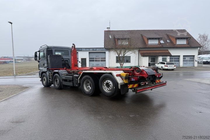 Hákový nosič kontejnerů MAN TGS 35.440 8x2 Stummer / Swiss-Vehicle
