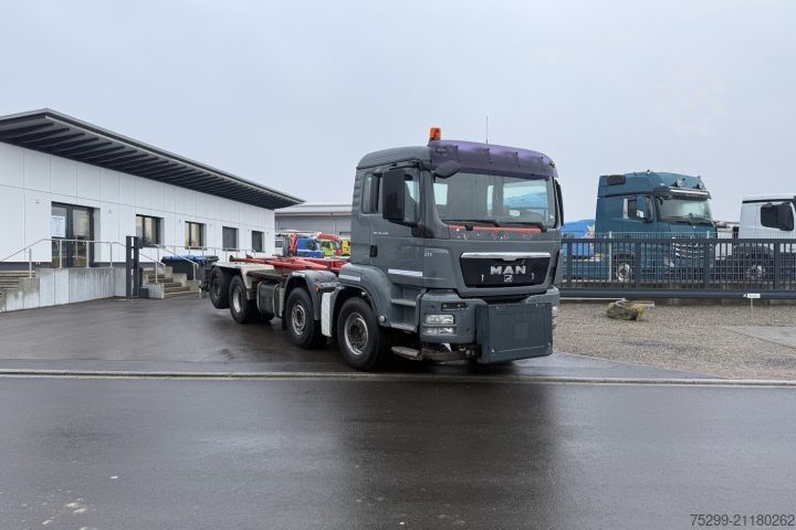 Hákový nosič kontejnerů MAN TGS 35.440 8x2 Stummer / Swiss-Vehicle