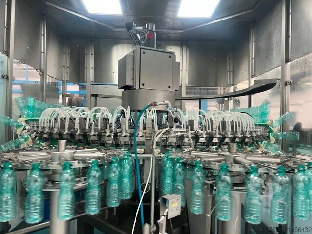 Begagnad KRONES fyllningstriblock för kolsyrat vatten, 25 000 flaskor per timme – tillverkningsår 20 Krones 