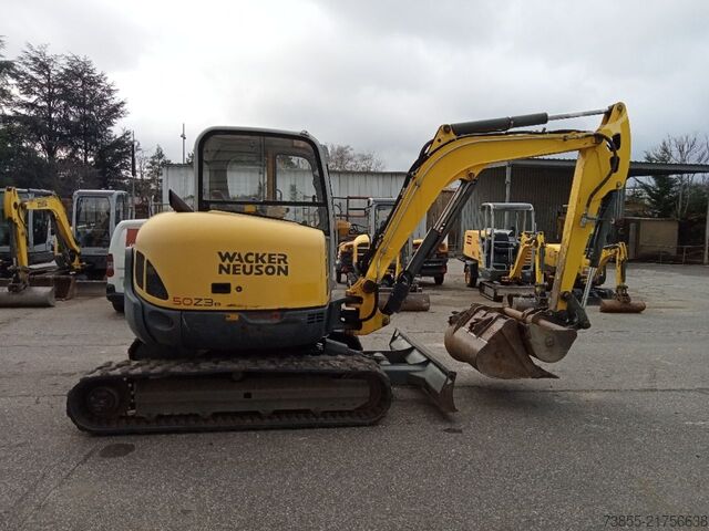 Minirypadlo < 7t Wacker Neuson 50Z3 with 3 excavator buckets