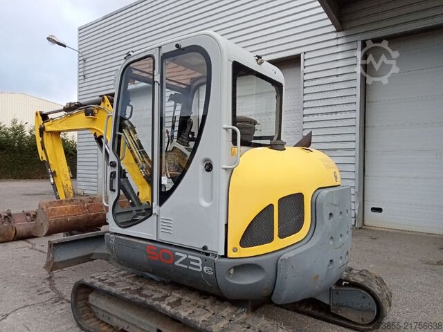 Minirypadlo < 7t Wacker Neuson 50Z3 with 3 excavator buckets