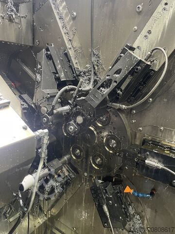 Torno automático de cabezal móvil Tornos MultiSwiss 6x16