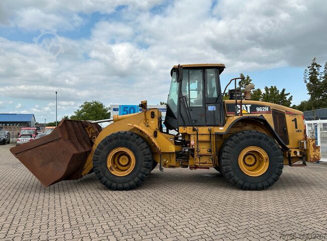 Wheel loader CATERPILLAR Radlader 962H/ AC/ 9.300 Bh/ Scheckheft CAT