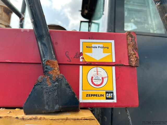 Wheel loader CATERPILLAR Radlader 962H/ AC/ 9.300 Bh/ Scheckheft CAT