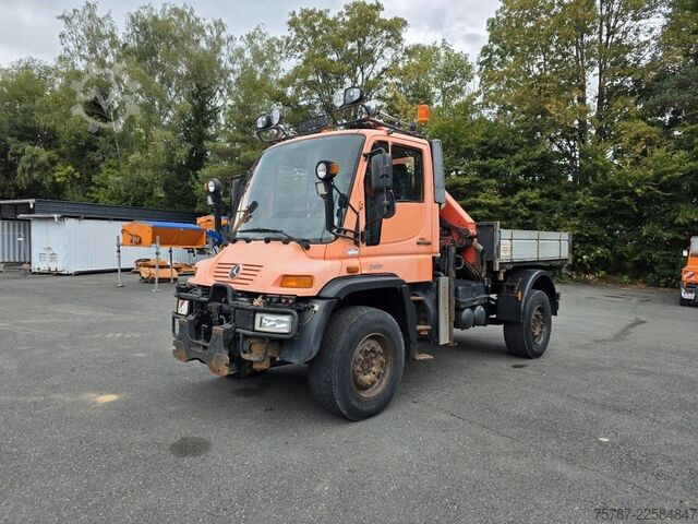 Outro UNIMOG U 500 3-Seiten-Kipper mit Kran PK 9501